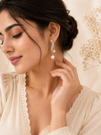 Curved Pearl Dangle Earrings with CZ Detail in 18K Gold Plating