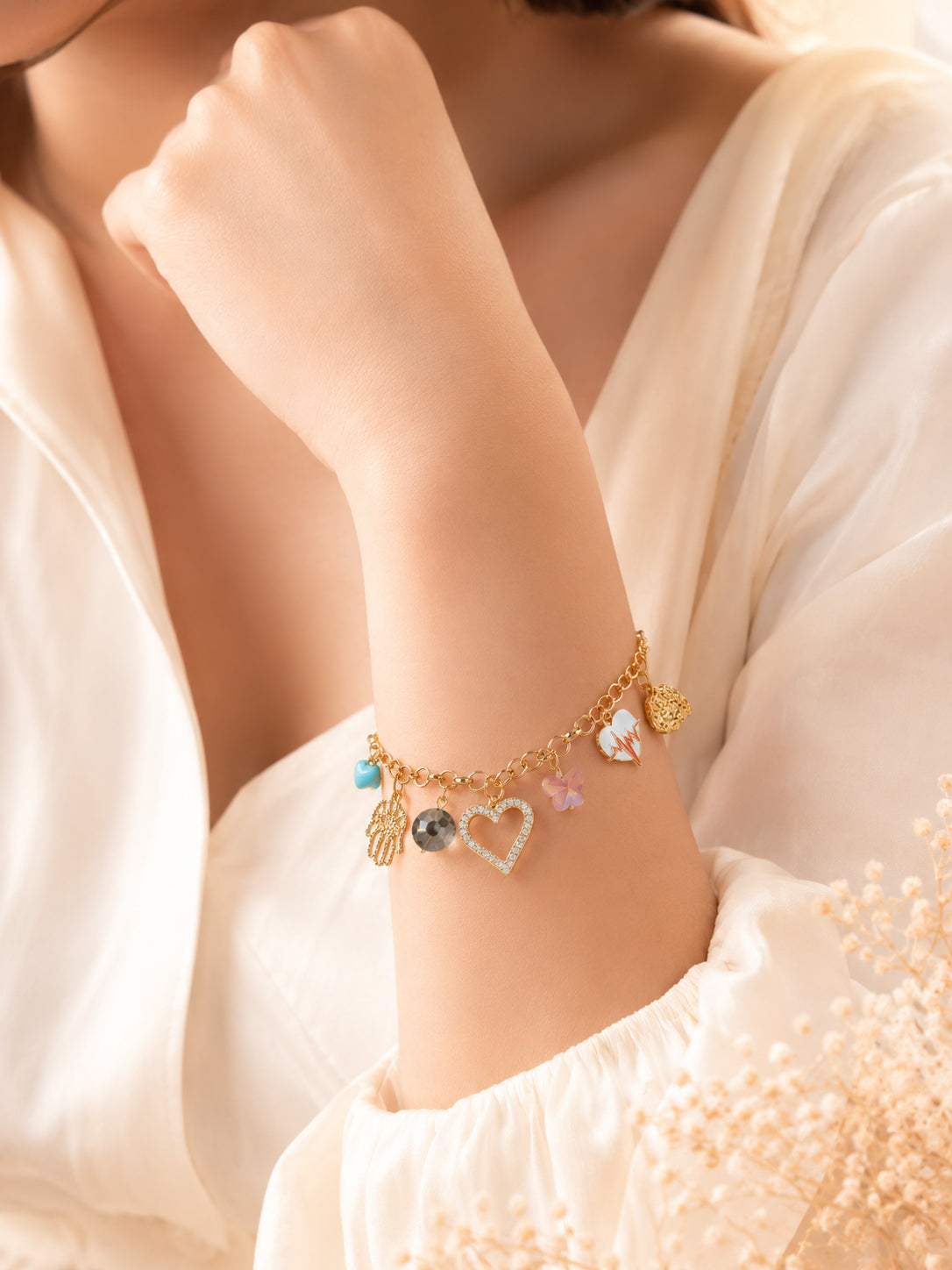 Aanura Multicharm Gold Bracelet with Motifs