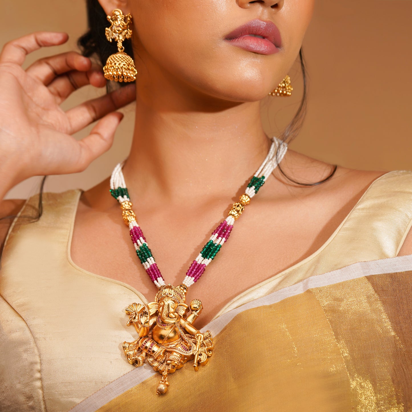Aanura Gold Plated Sacred Motif Long Necklace Set