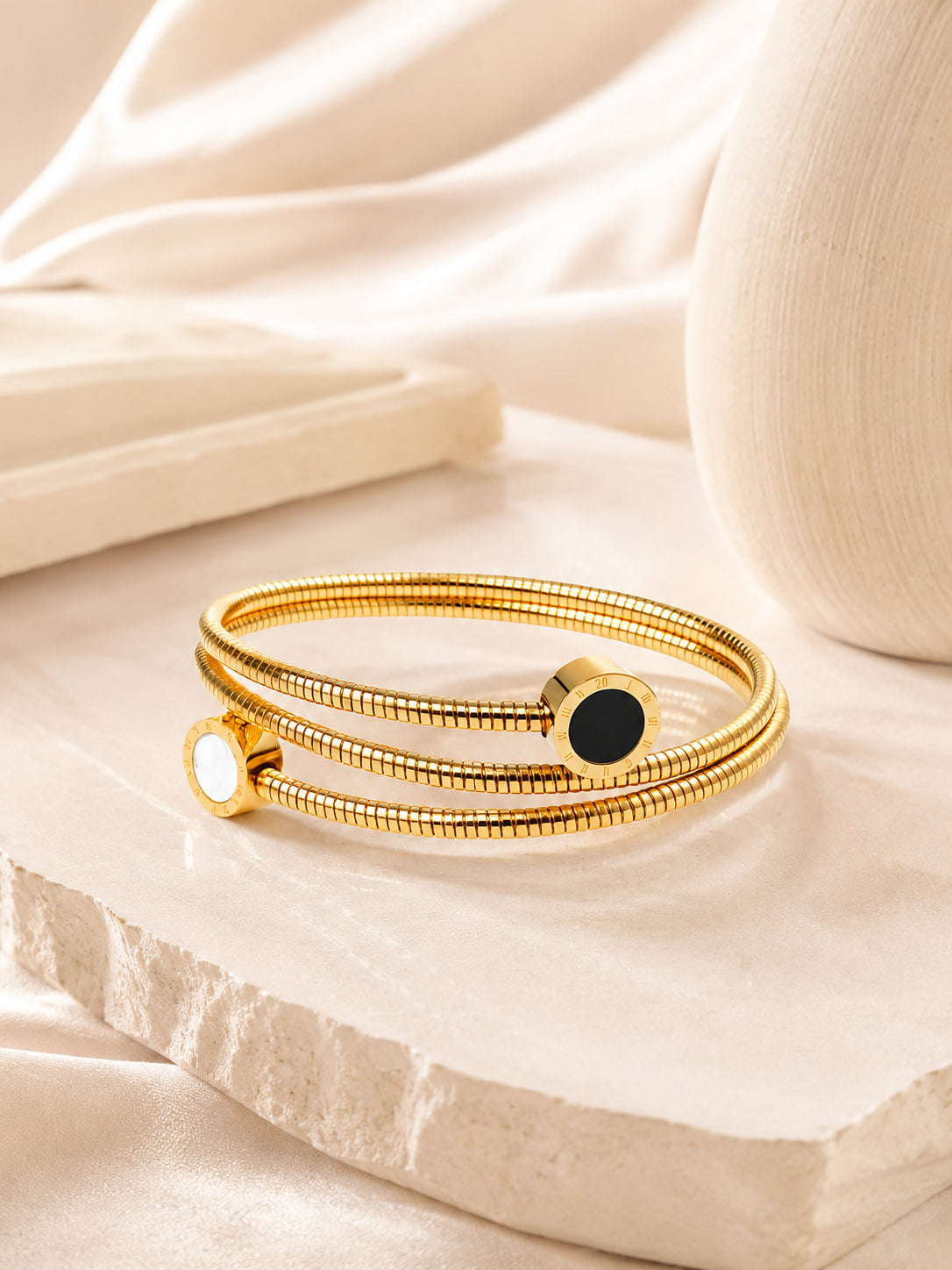 Aanura Dual-Tone Roman Coin Coil Bracelet