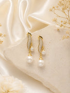 Curved Pearl Dangle Earrings with CZ Detail in 18K Gold Plating