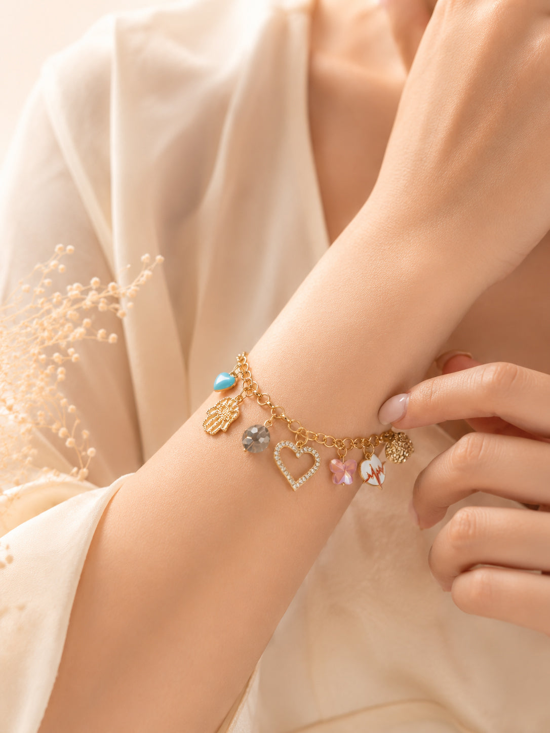 Aanura Multicharm Gold Bracelet with Motifs