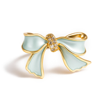 Gold Bow Enamel Brooch with Crystal Center