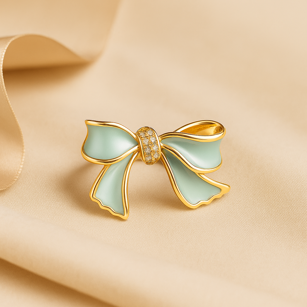 Gold Bow Enamel Brooch with Crystal Center