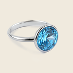 Aanura Blue Solitaire Gold Ring – Elegant Statement Jewelry