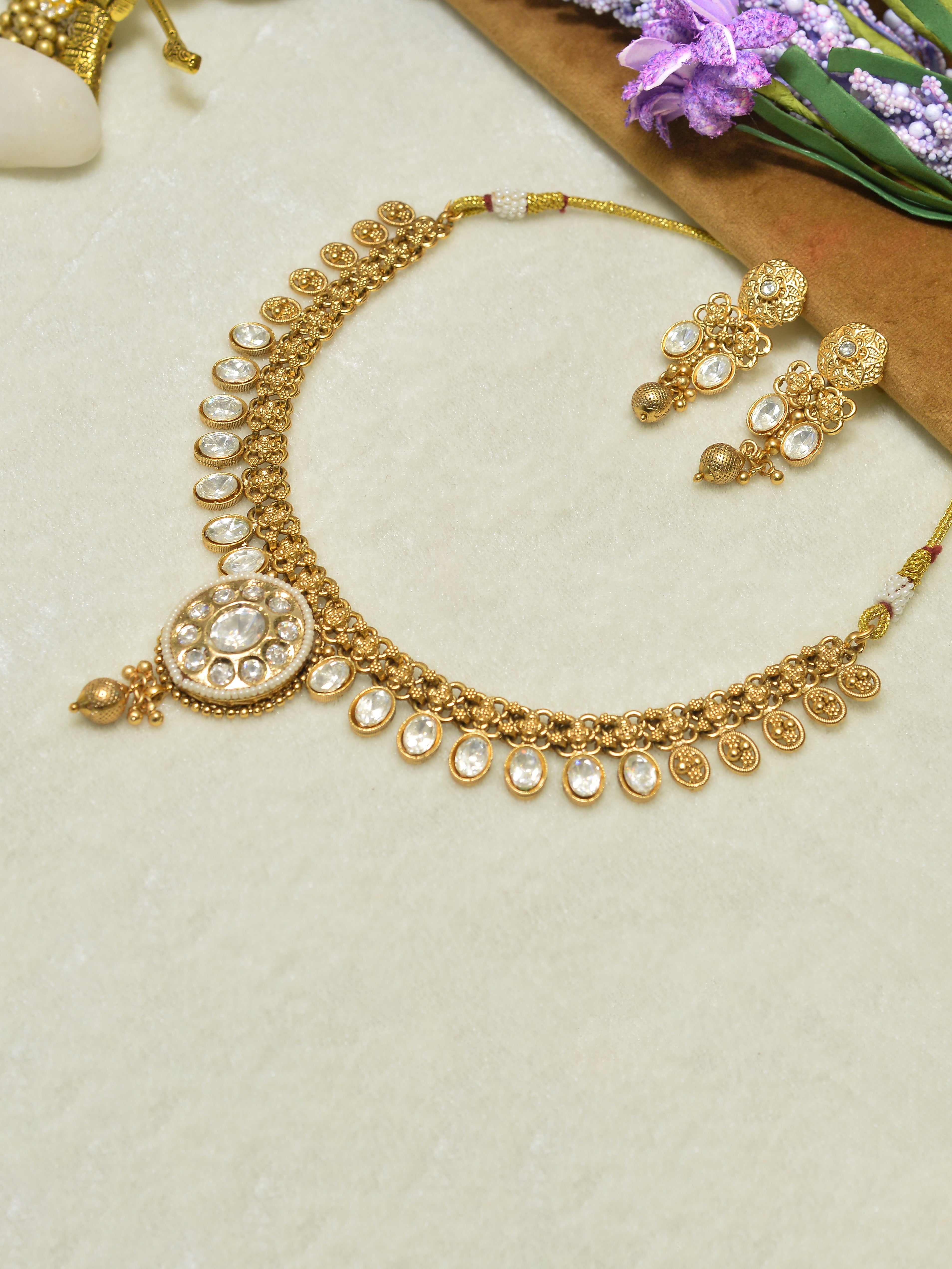 Aanura Ruby Beaded Kundan Necklace with Earrings