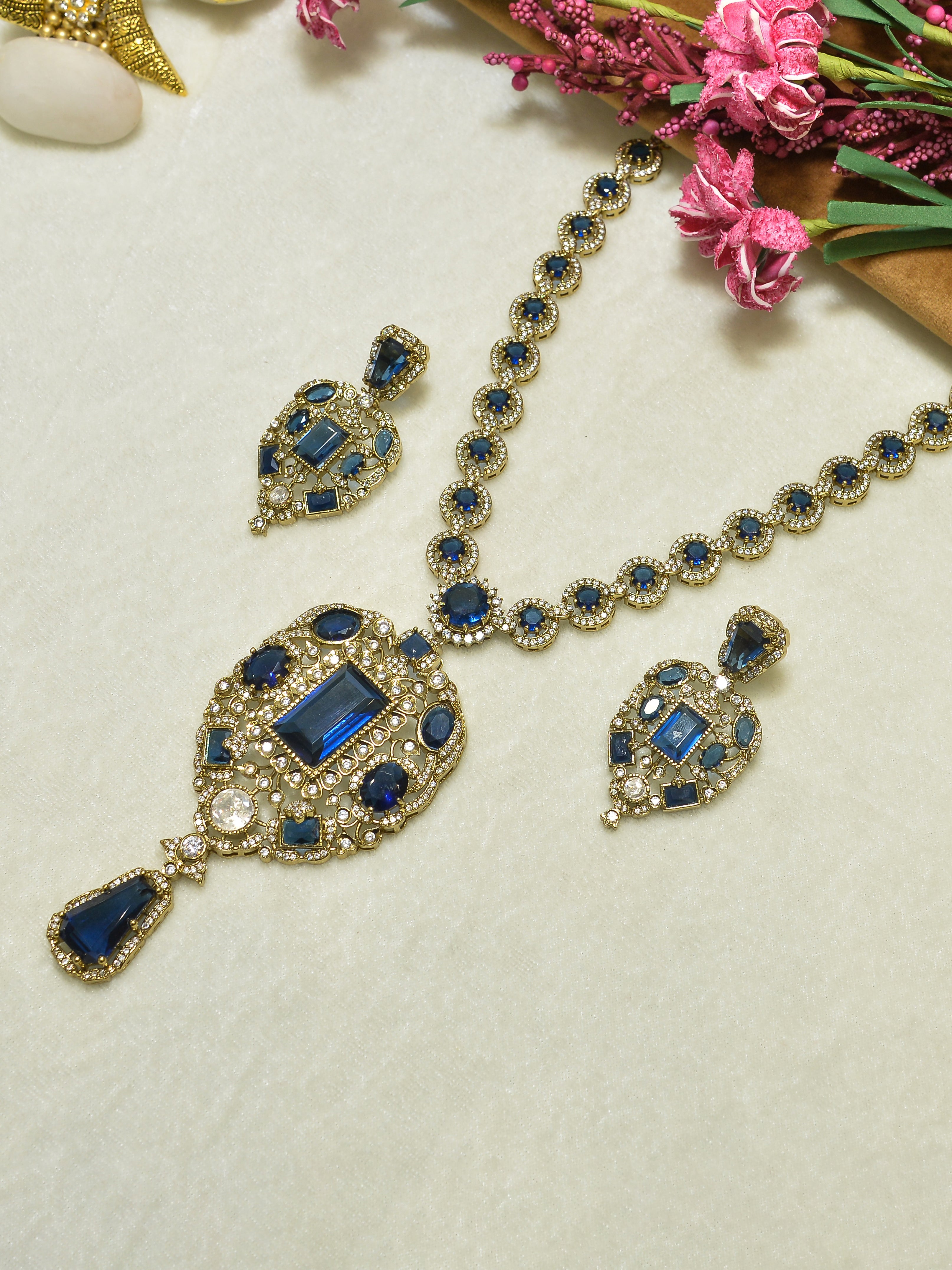 Aanura Red Stone Antique Kundan Necklace & Earrings
