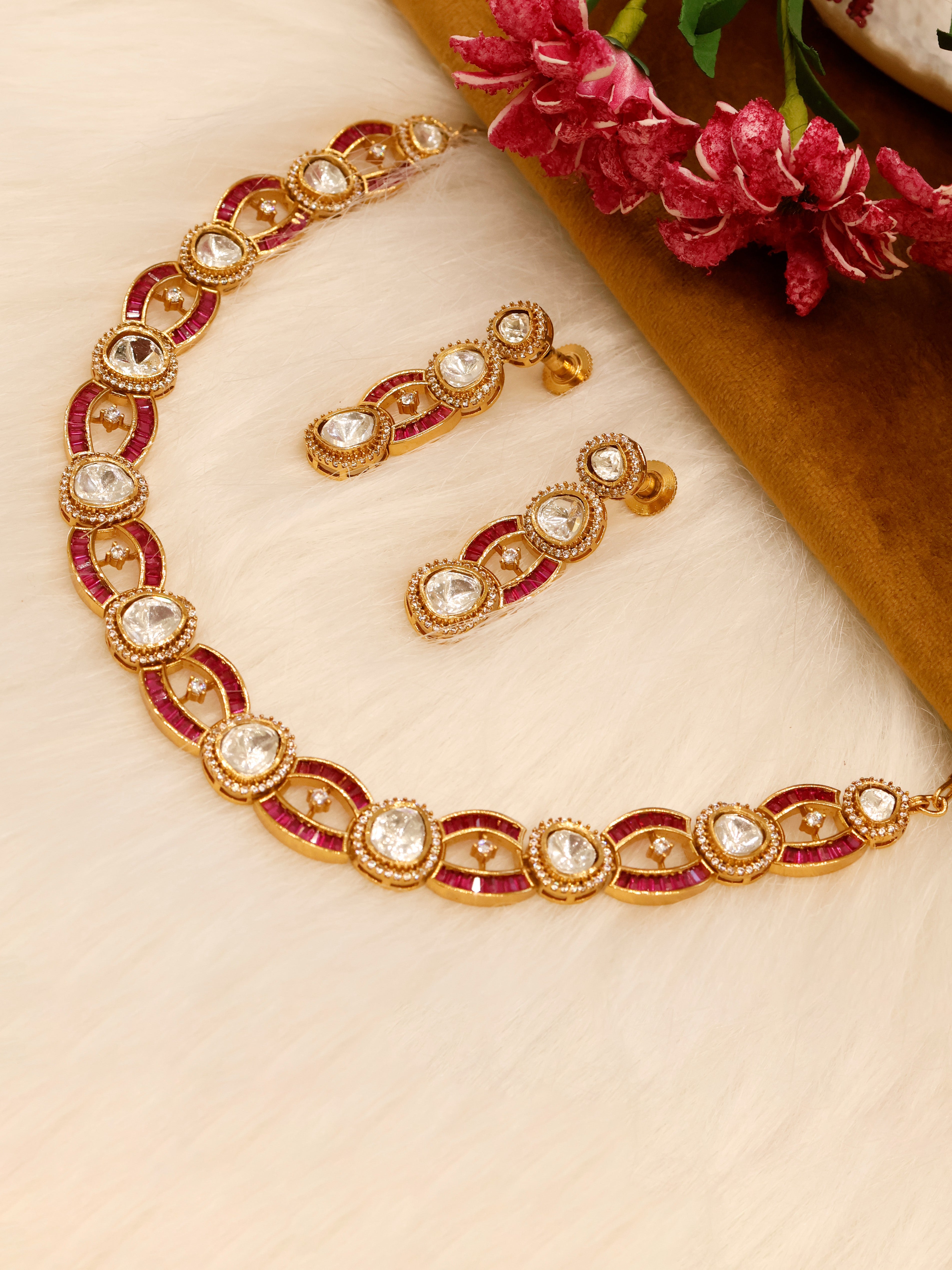 Aanura Oval Kundan Linked Necklace & Earrings