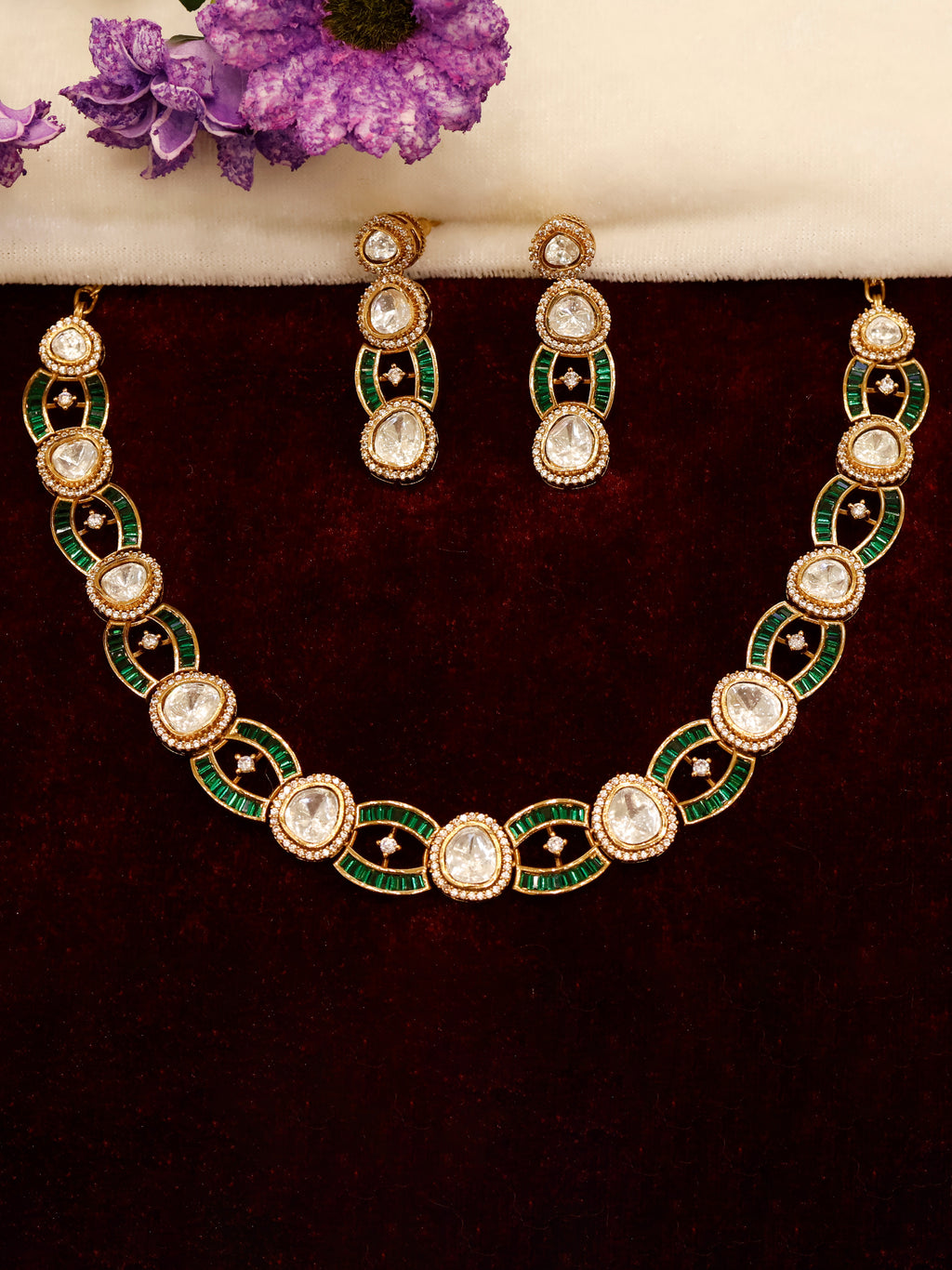 Aanura Oval Kundan Linked Necklace & Earrings