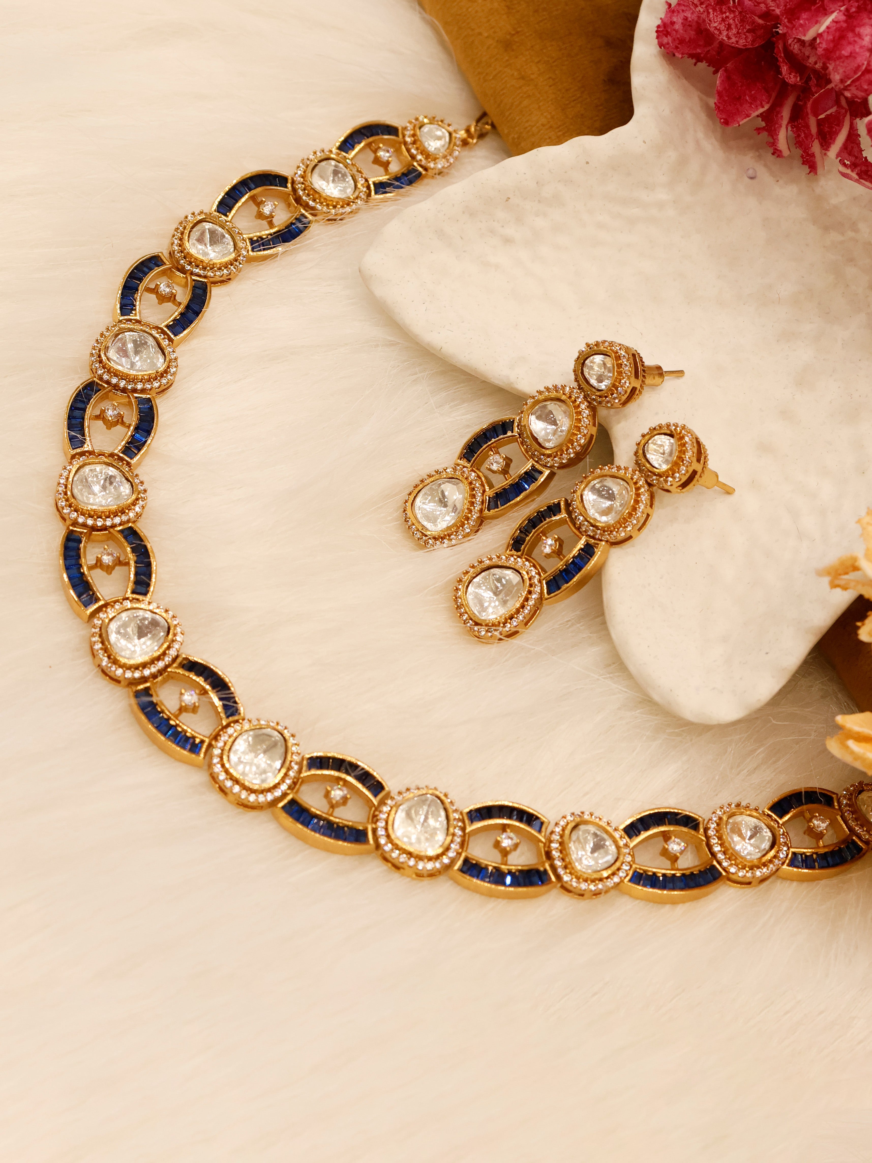 Aanura Oval Kundan Linked Necklace & Earrings