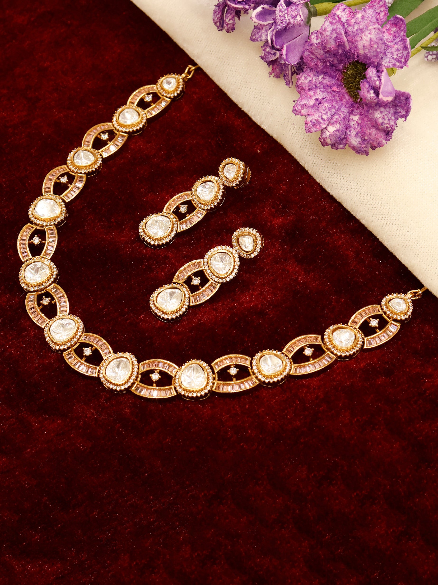 Aanura Oval Kundan Linked Necklace & Earrings