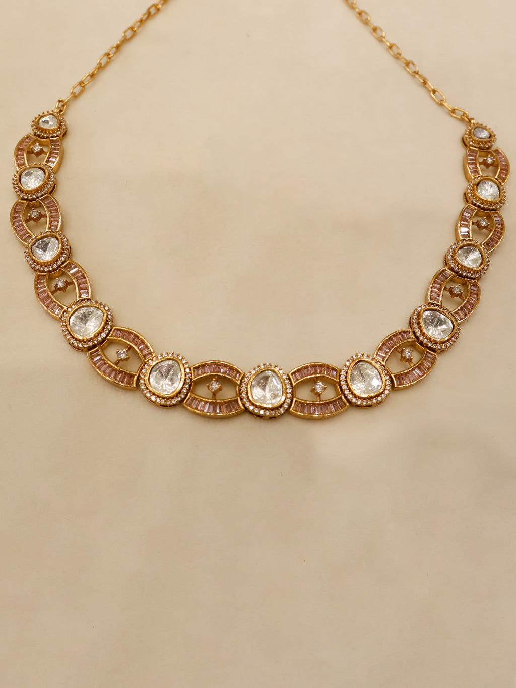 Aanura Oval Kundan Linked Necklace & Earrings
