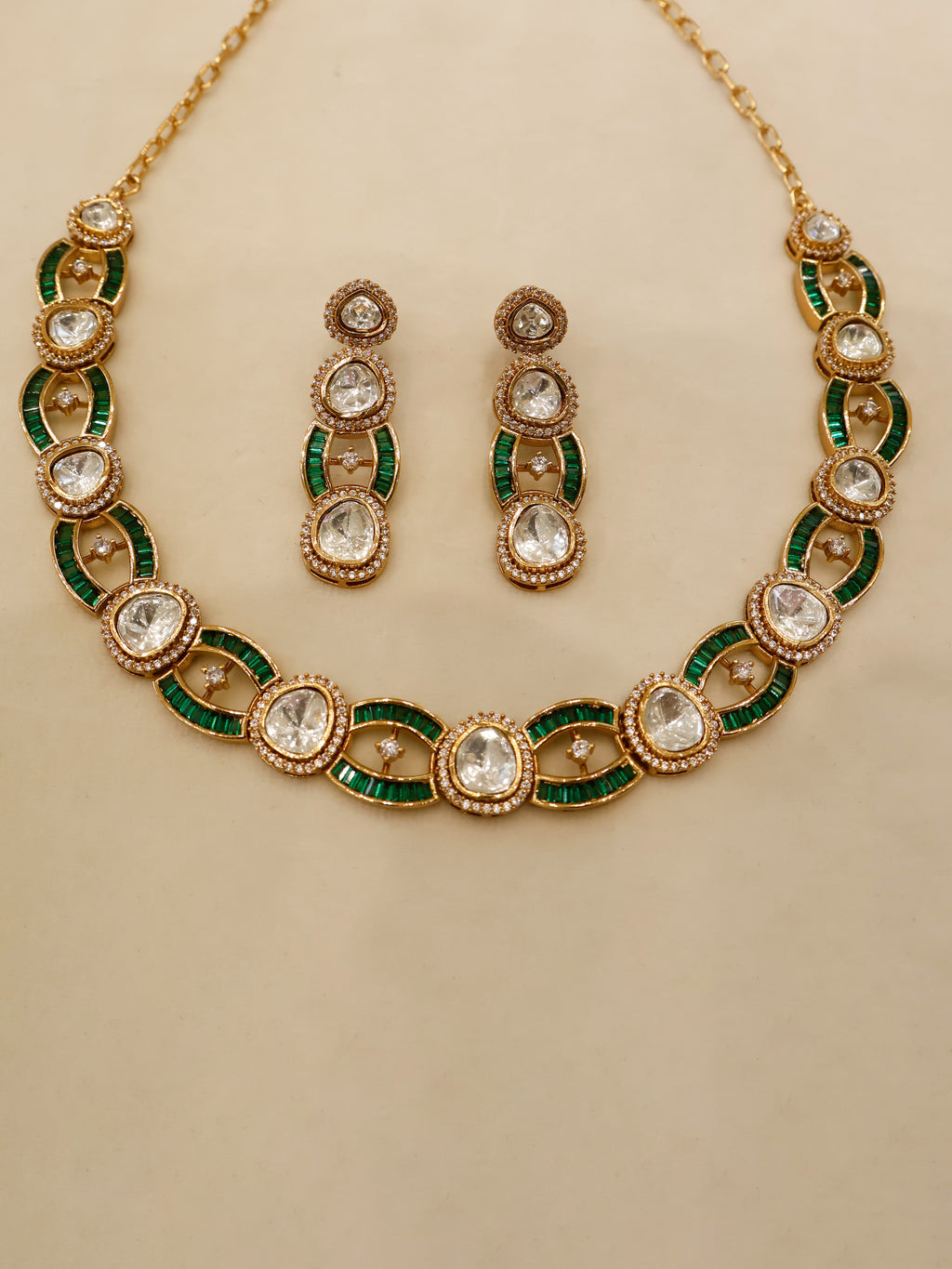 Aanura Oval Kundan Linked Necklace & Earrings