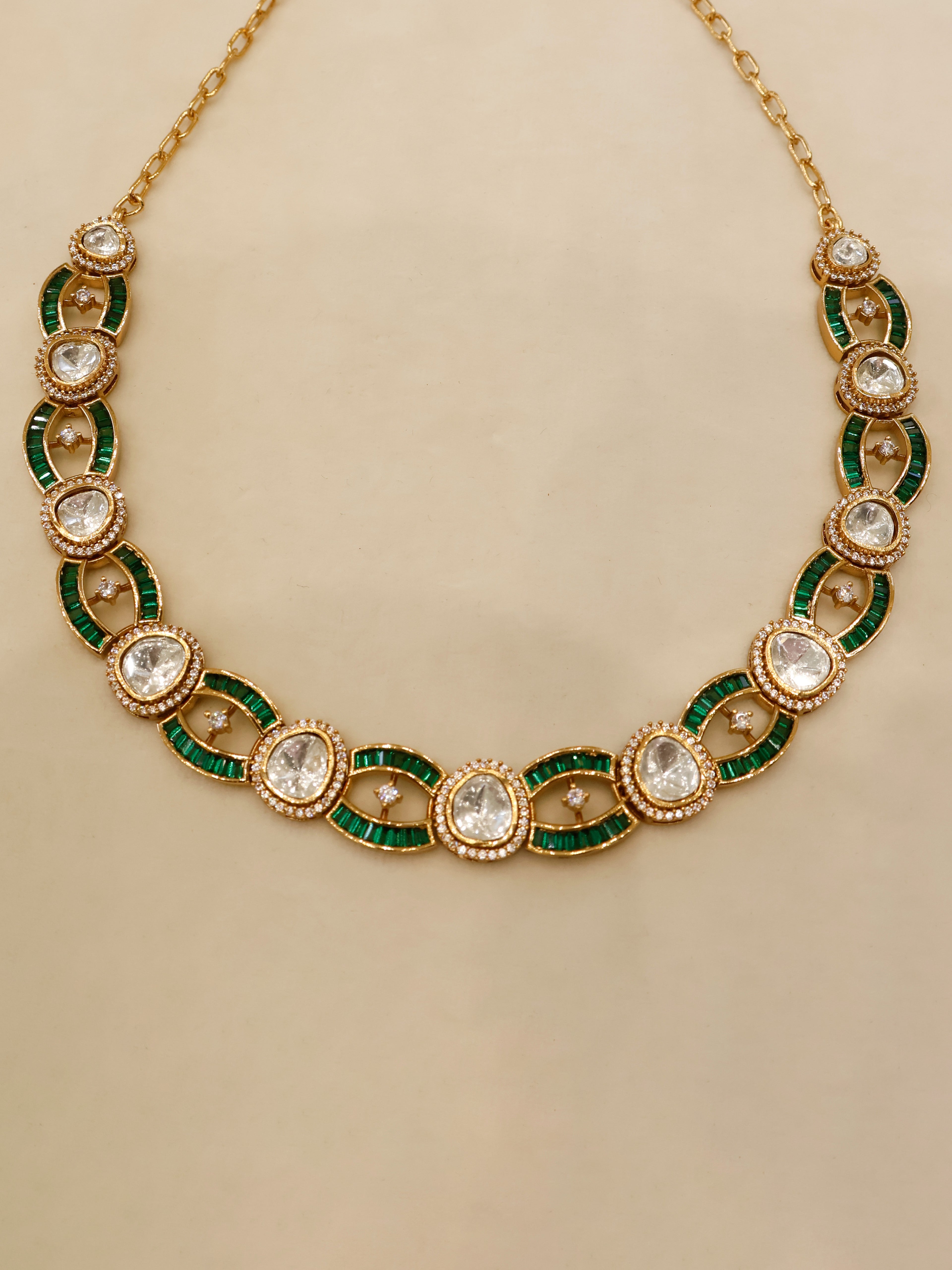 Aanura Oval Kundan Linked Necklace & Earrings