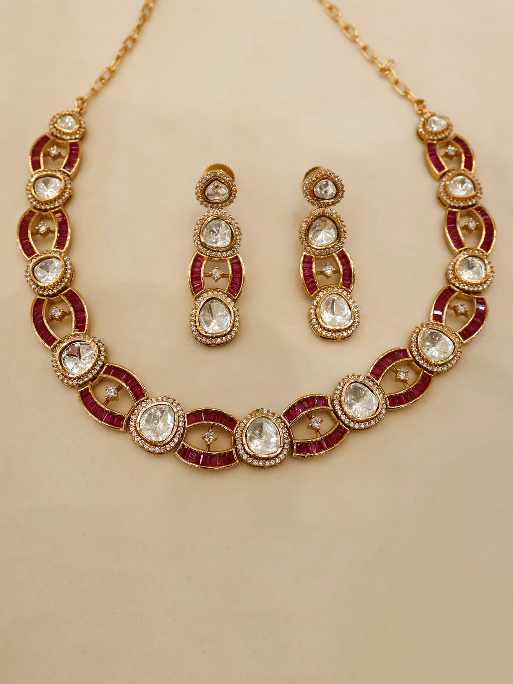 Aanura Oval Kundan Linked Necklace & Earrings