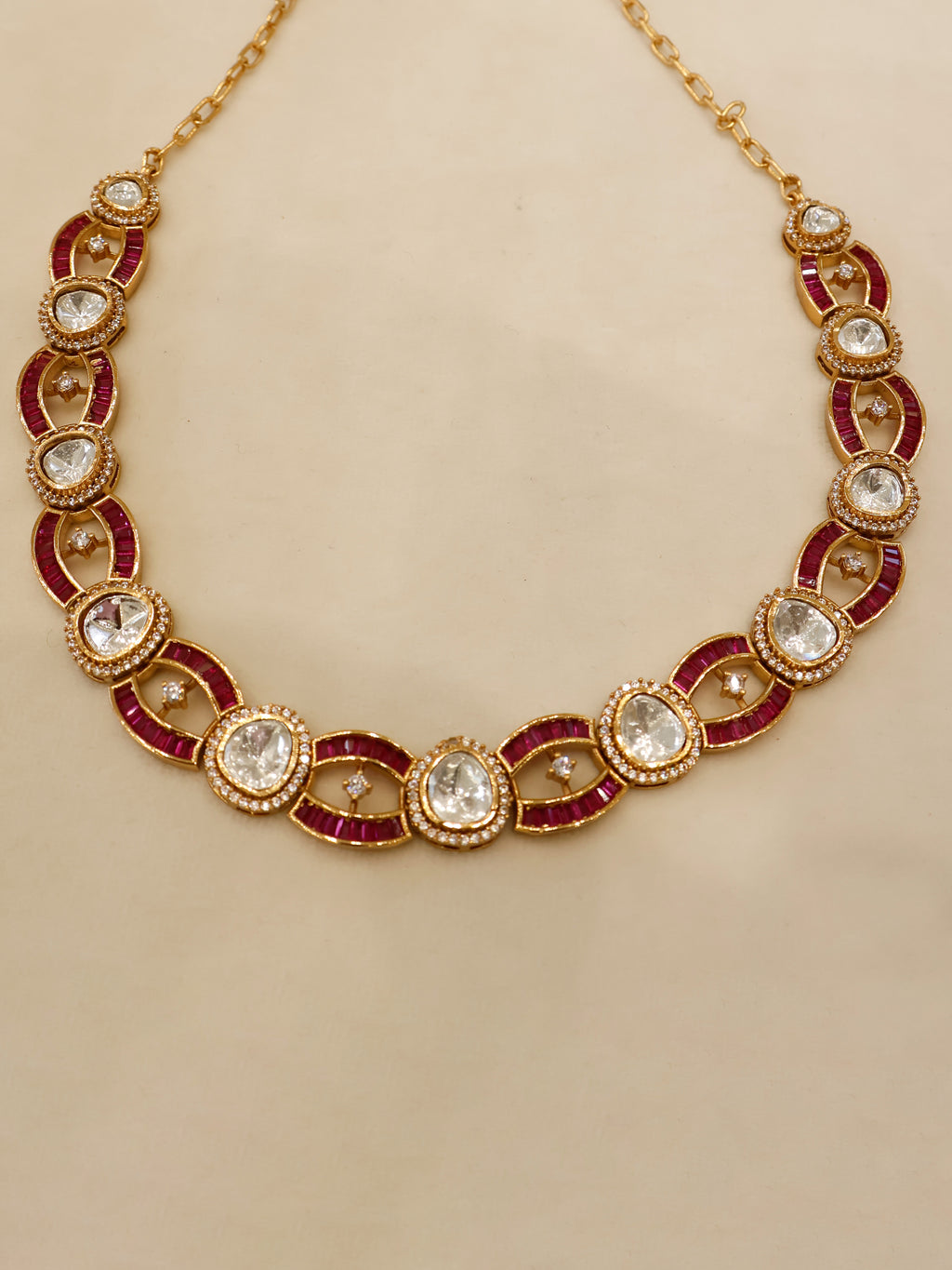 Aanura Oval Kundan Linked Necklace & Earrings