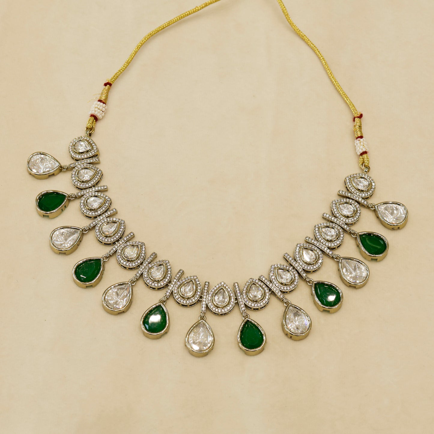 Aanura Teardrop Kundan Necklace with Dual-Tone Drops & Earrings