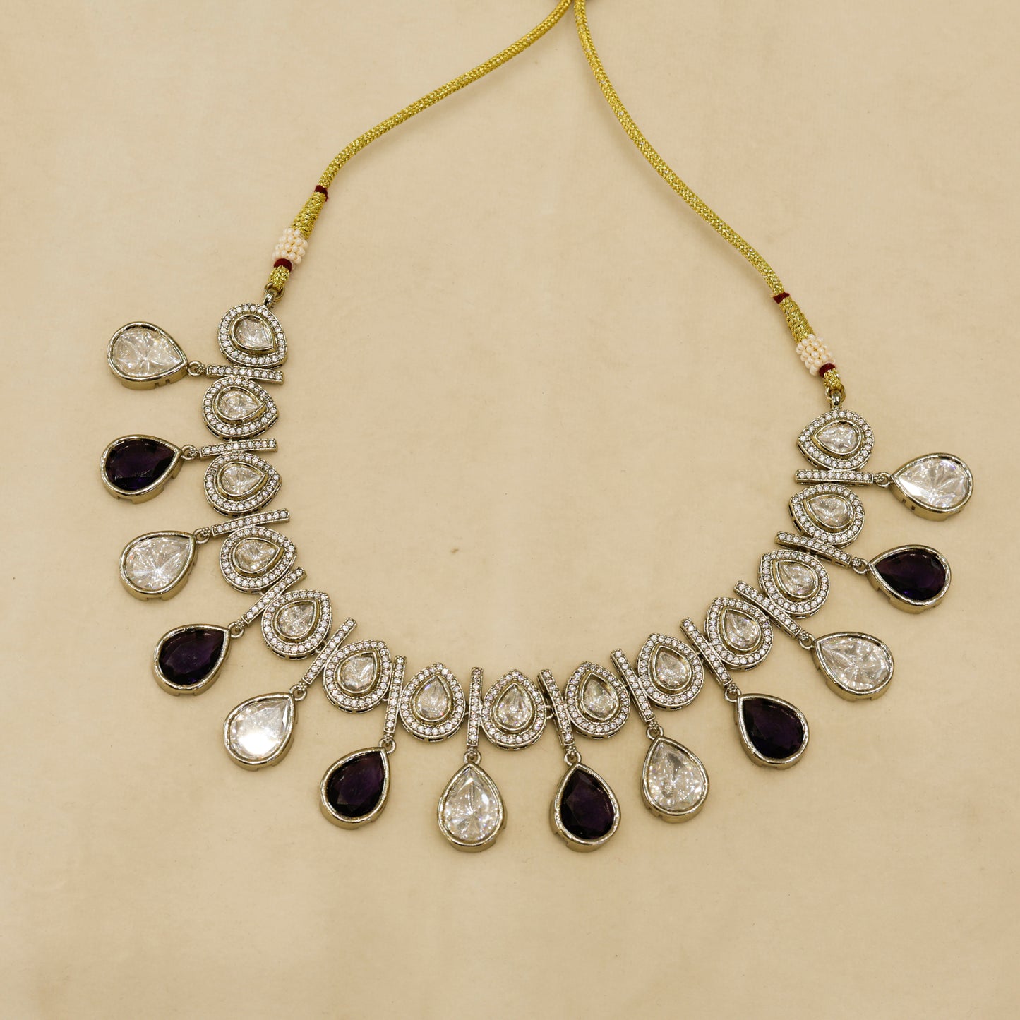 Aanura Teardrop Kundan Necklace with Dual-Tone Drops & Earrings