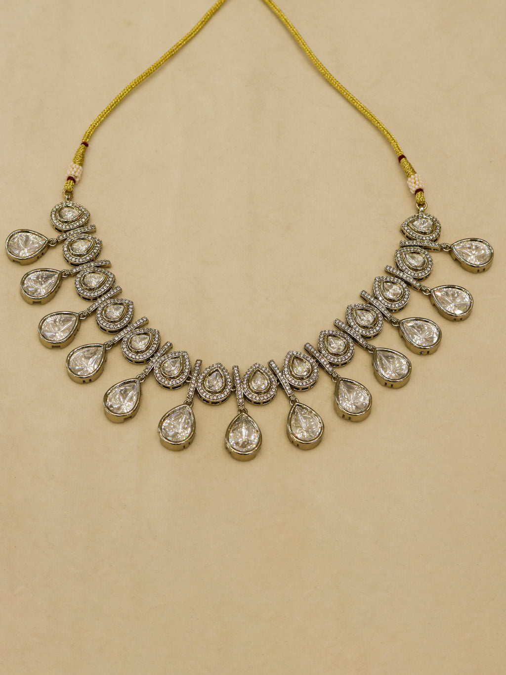 Aanura Teardrop Kundan Necklace with Dual-Tone Drops & Earrings