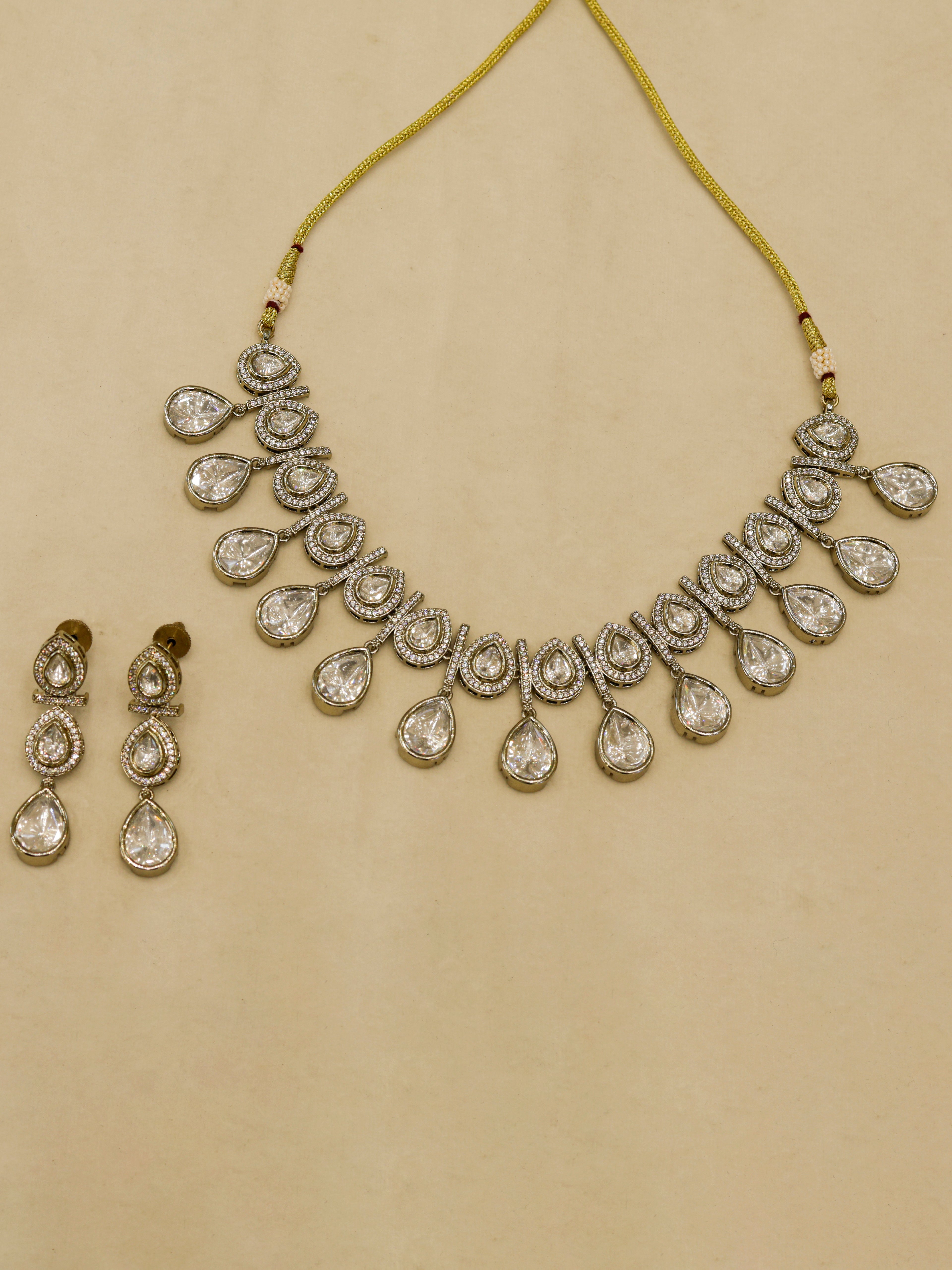 Aanura Teardrop Kundan Necklace with Dual-Tone Drops & Earrings