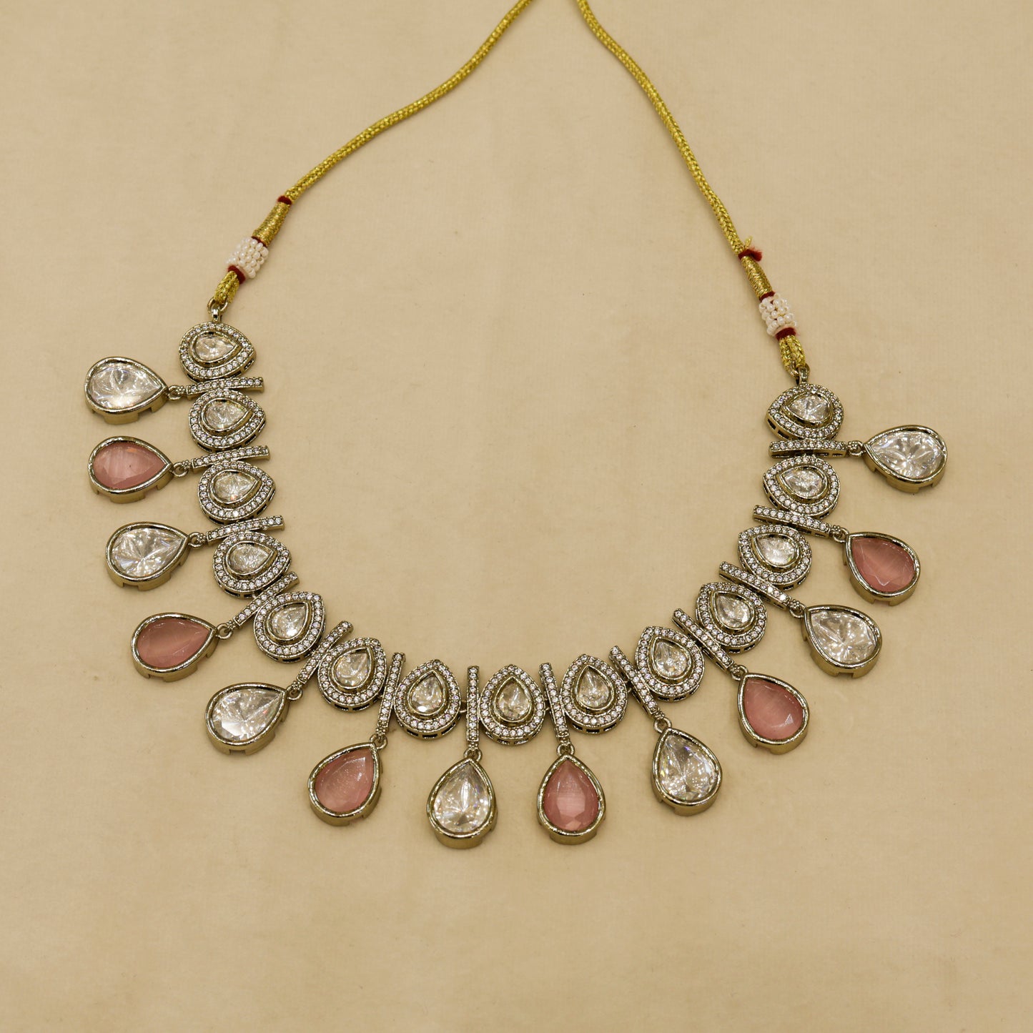 Aanura Teardrop Kundan Necklace with Dual-Tone Drops & Earrings