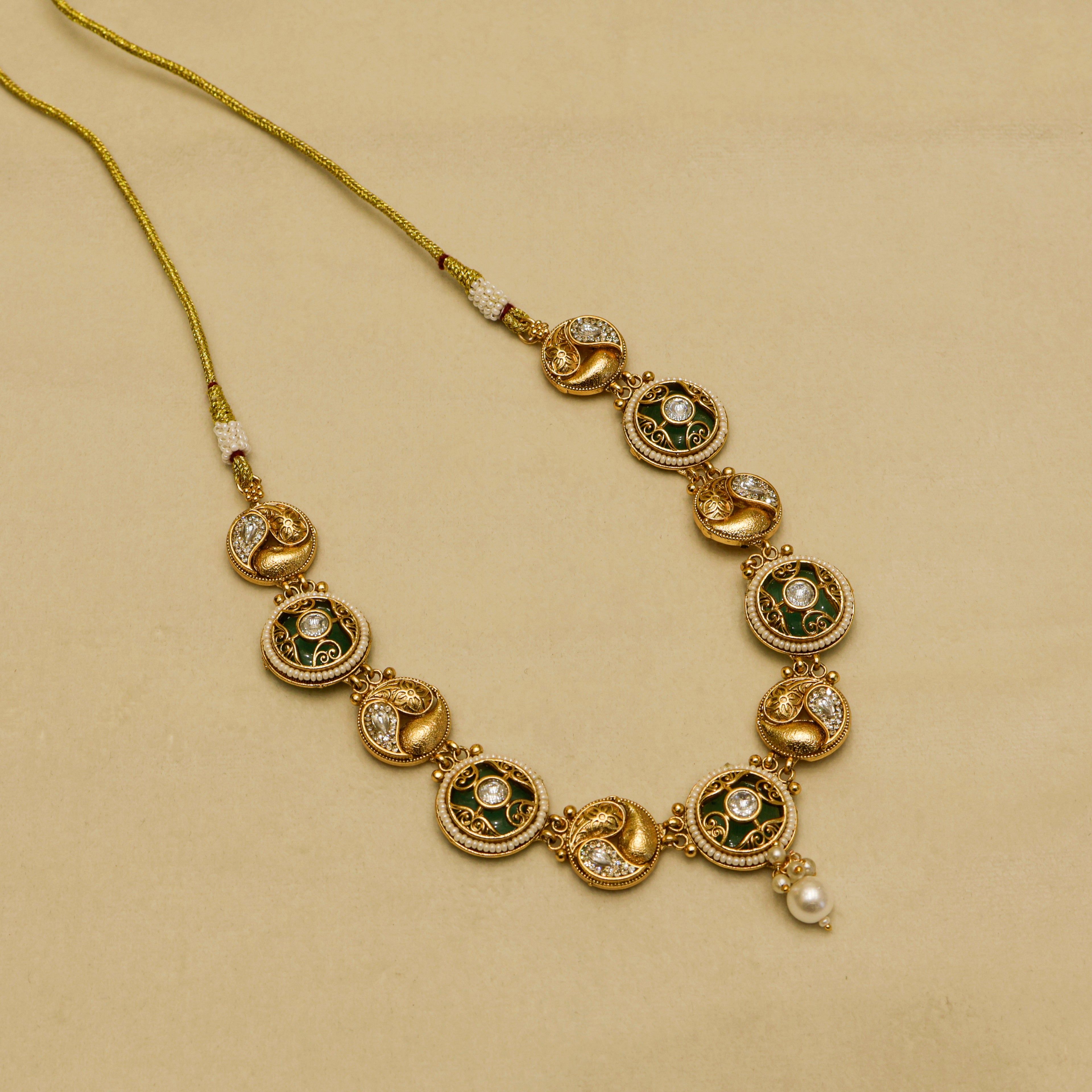 Aanura Circular Kundan Ruby Drop Necklace Set