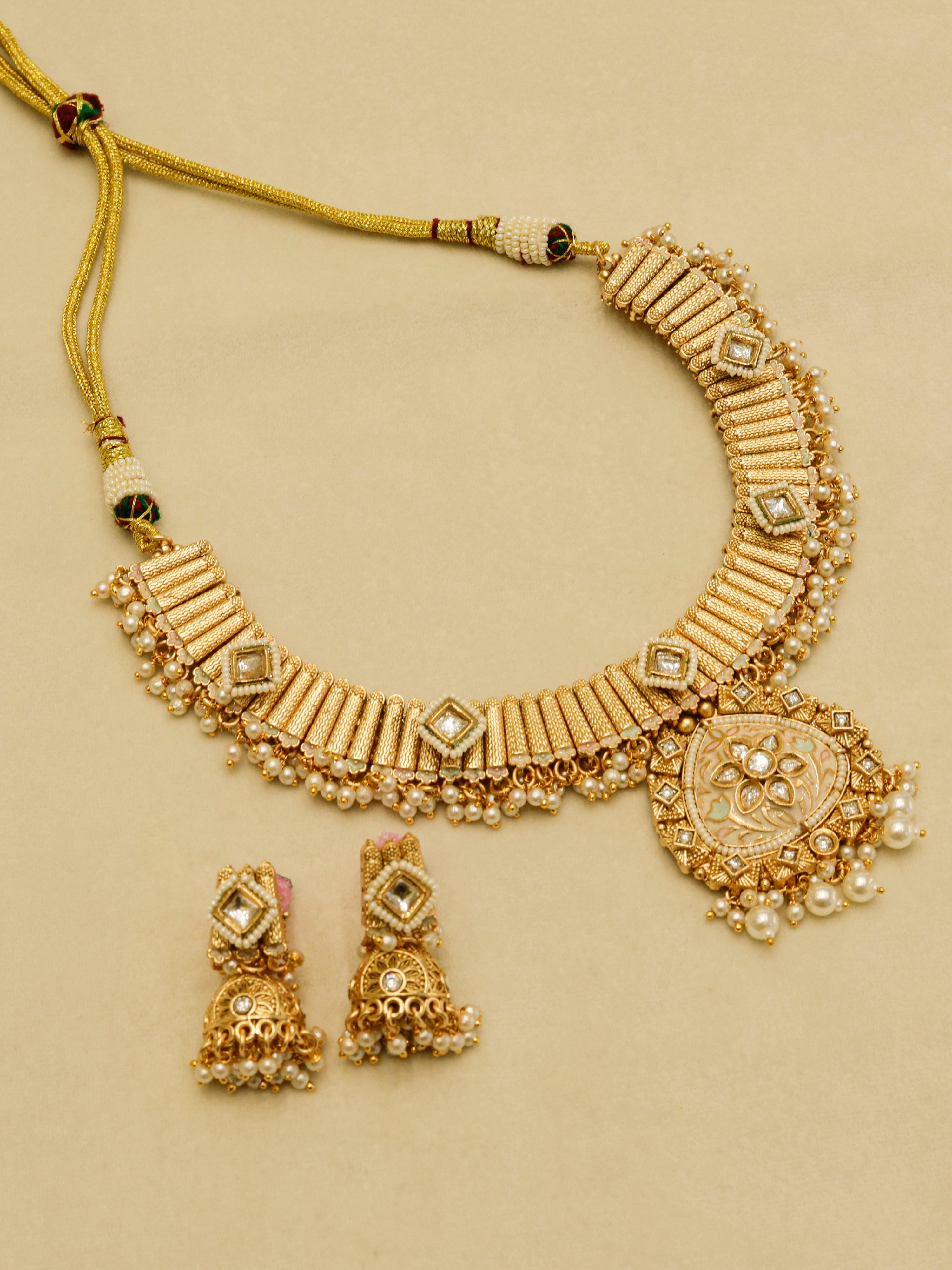 Aanura Kundan Choker Necklace with Green Stones & Pearls