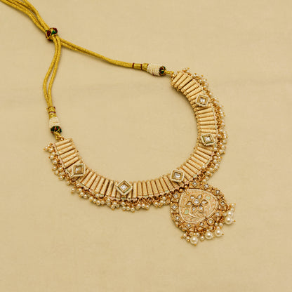 Aanura Kundan Choker Necklace with Green Stones & Pearls