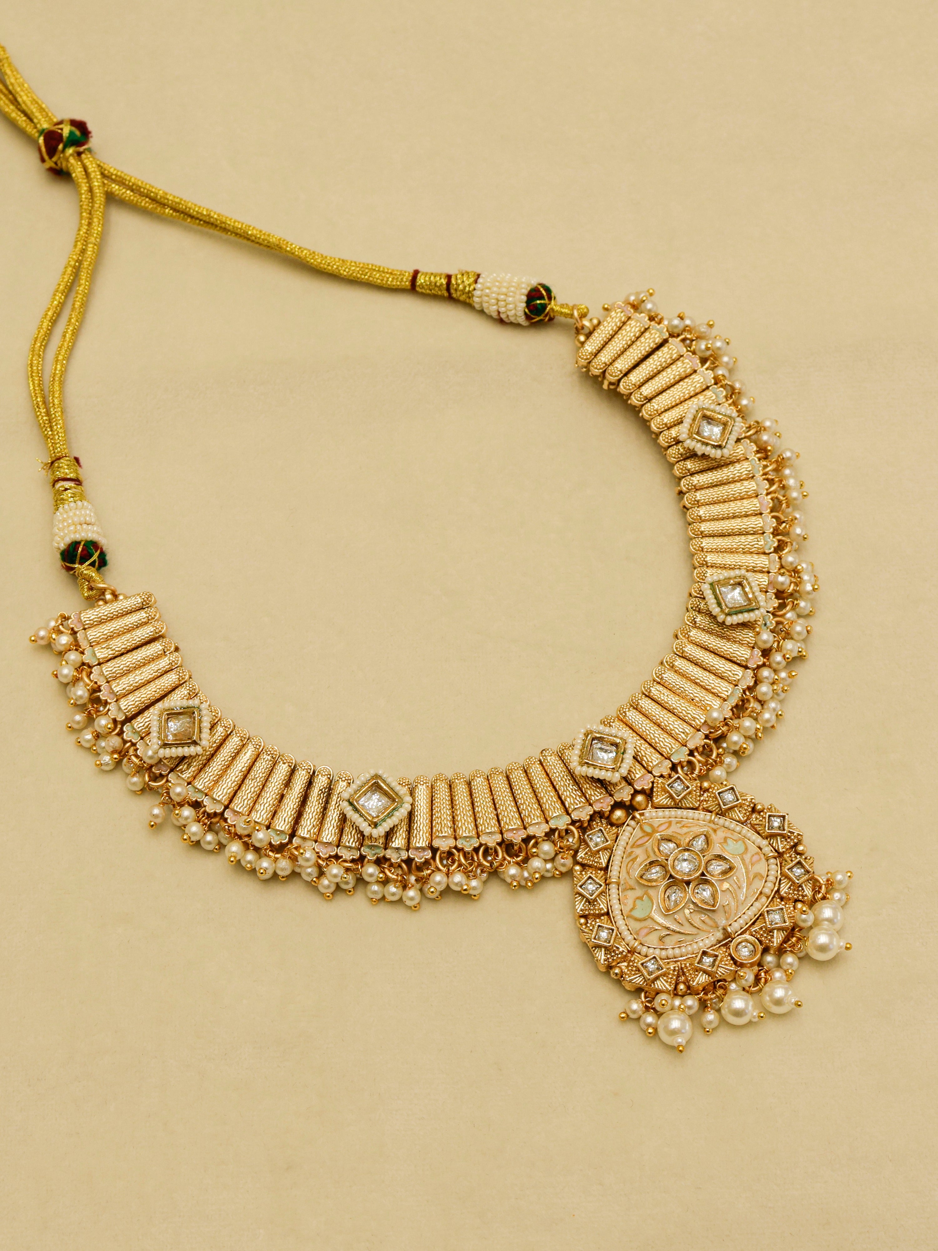 Aanura Kundan Choker Necklace with Green Stones & Pearls