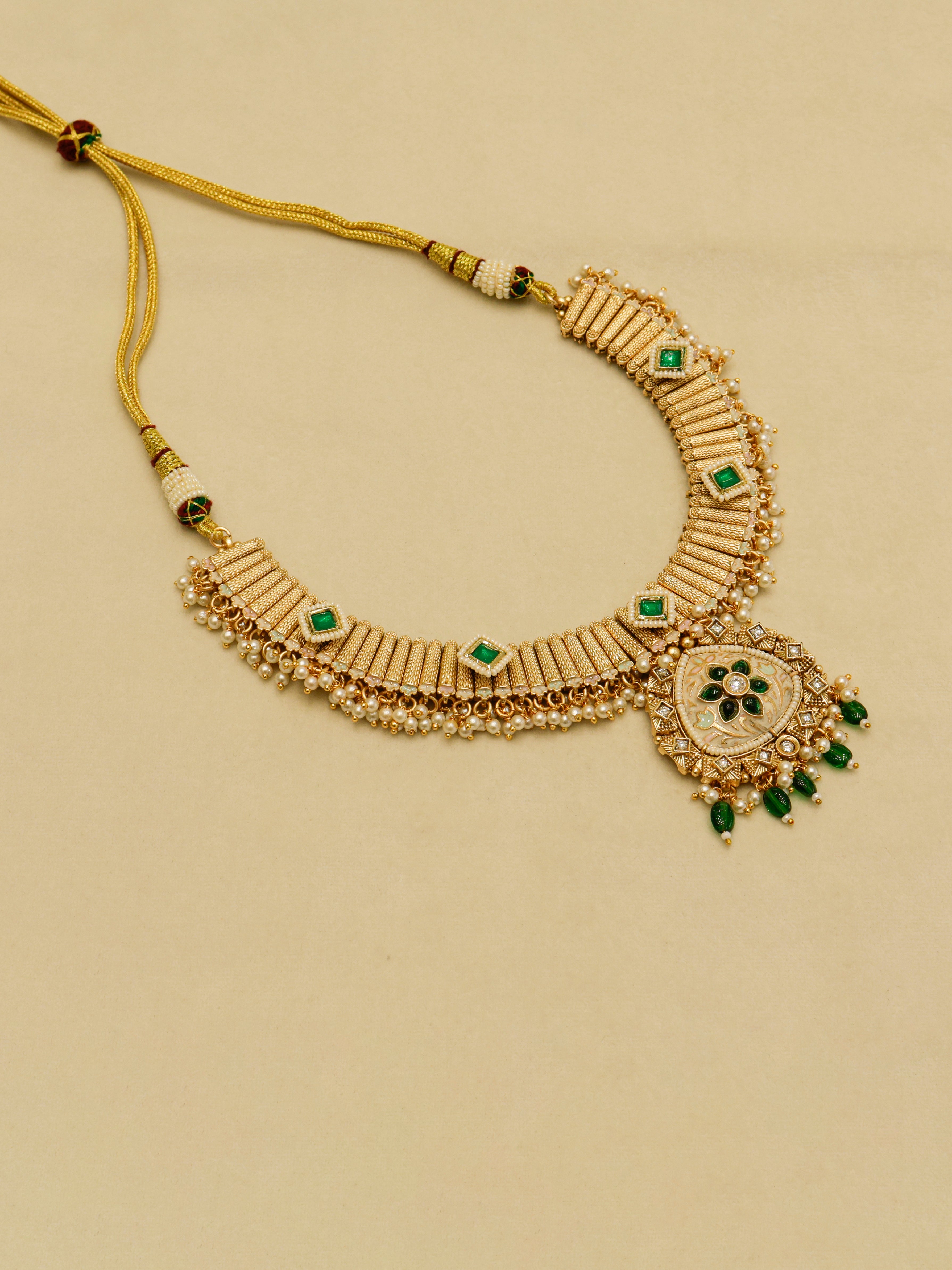 Aanura Kundan Choker Necklace with Green Stones & Pearls