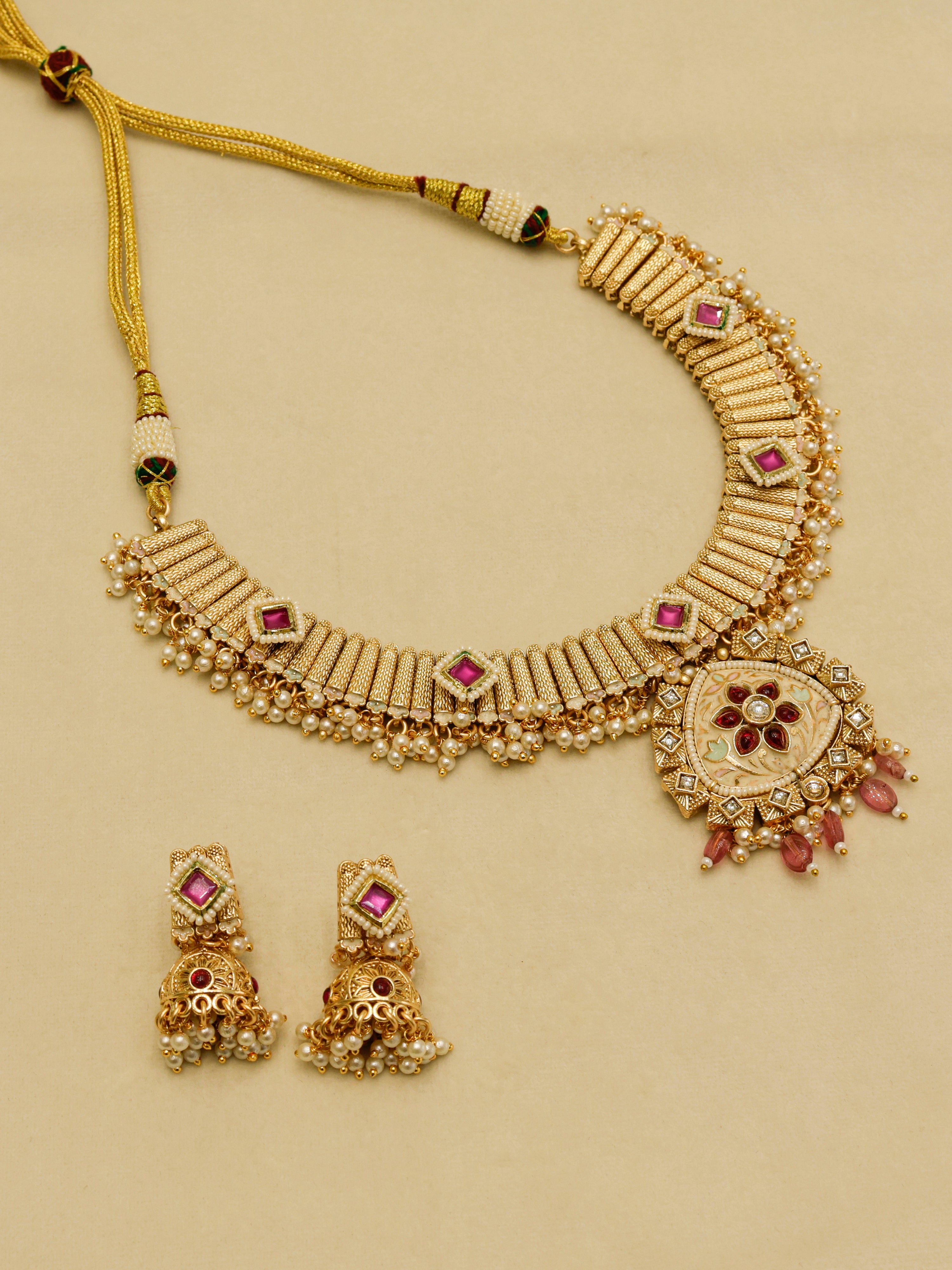 Aanura Kundan Choker Necklace with Green Stones & Pearls