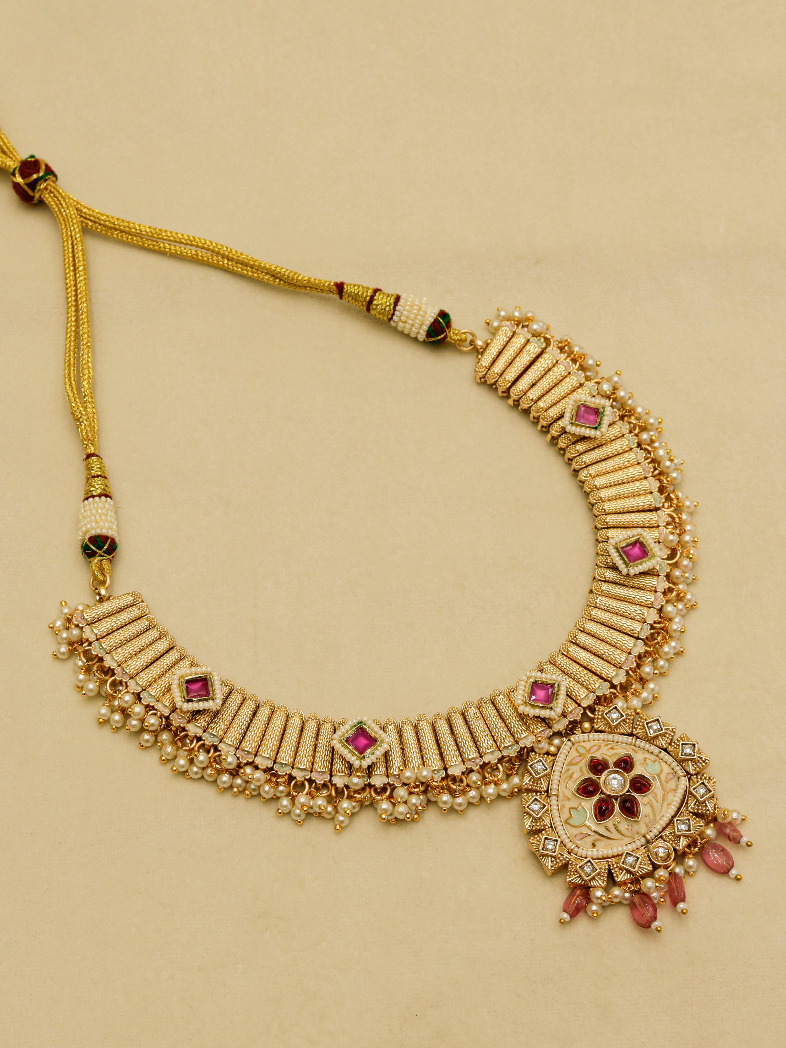 Aanura Kundan Choker Necklace with Green Stones & Pearls