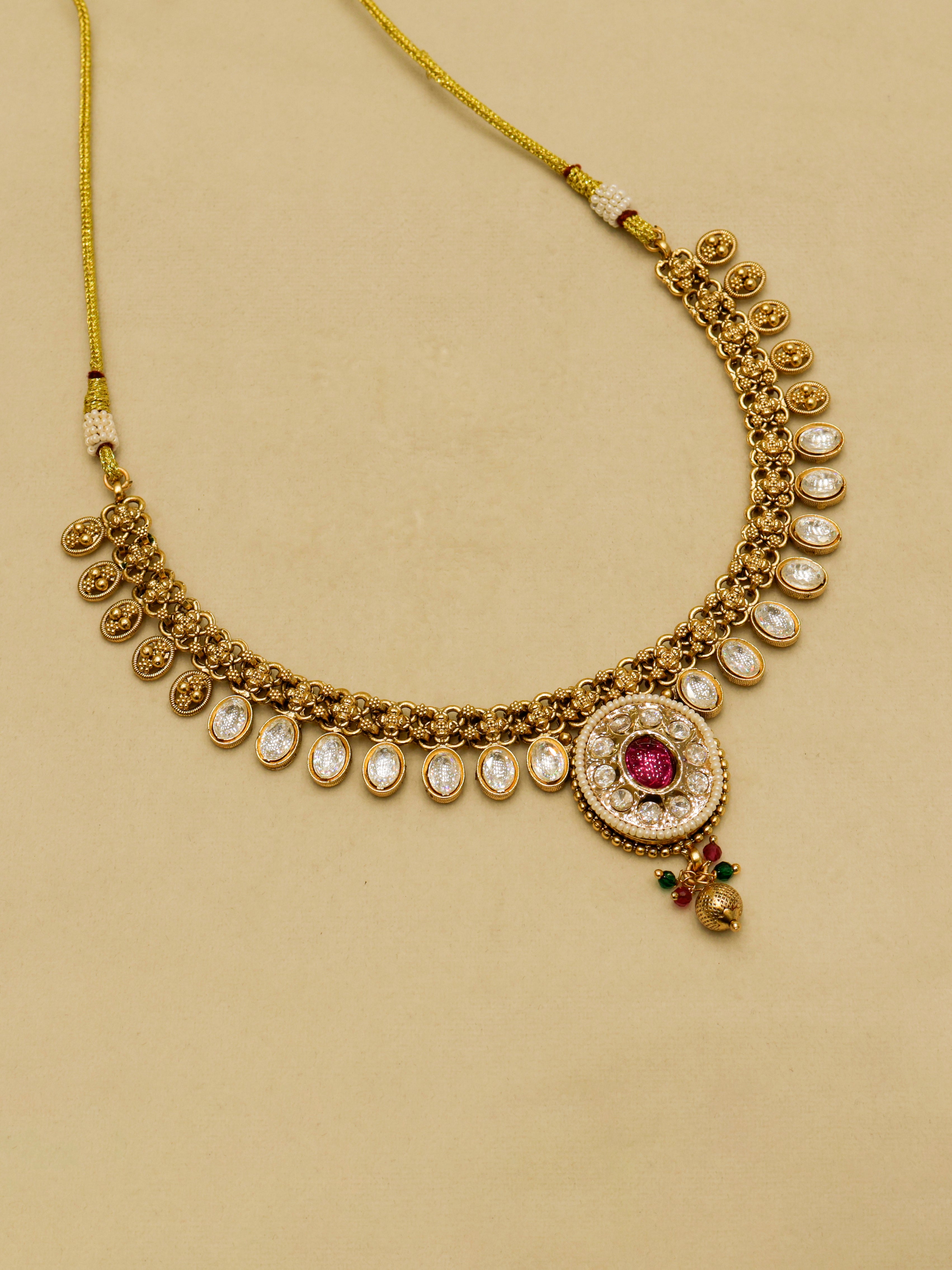 Aanura Ruby Beaded Kundan Necklace with Earrings