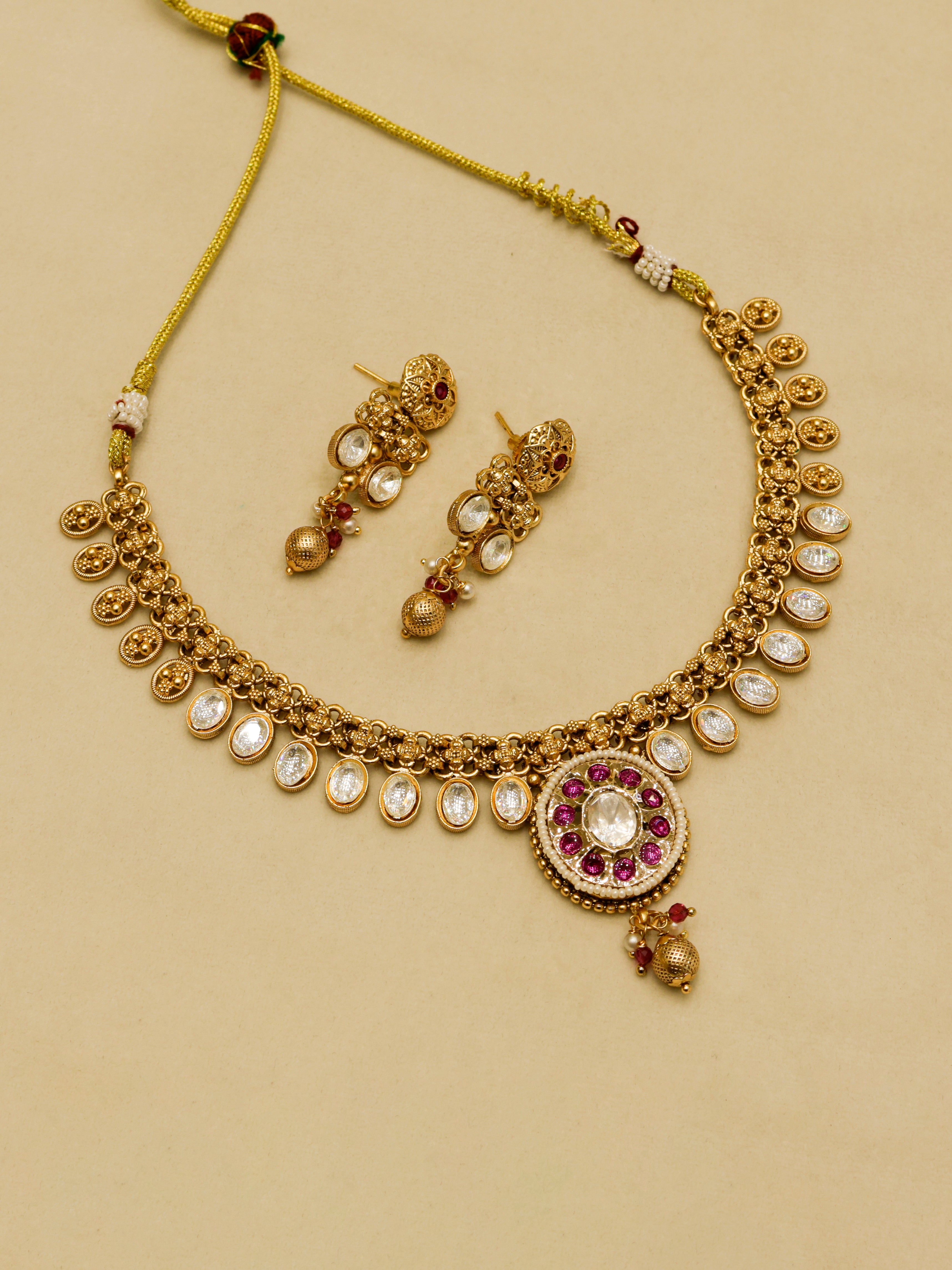 Aanura Ruby Beaded Kundan Necklace with Earrings