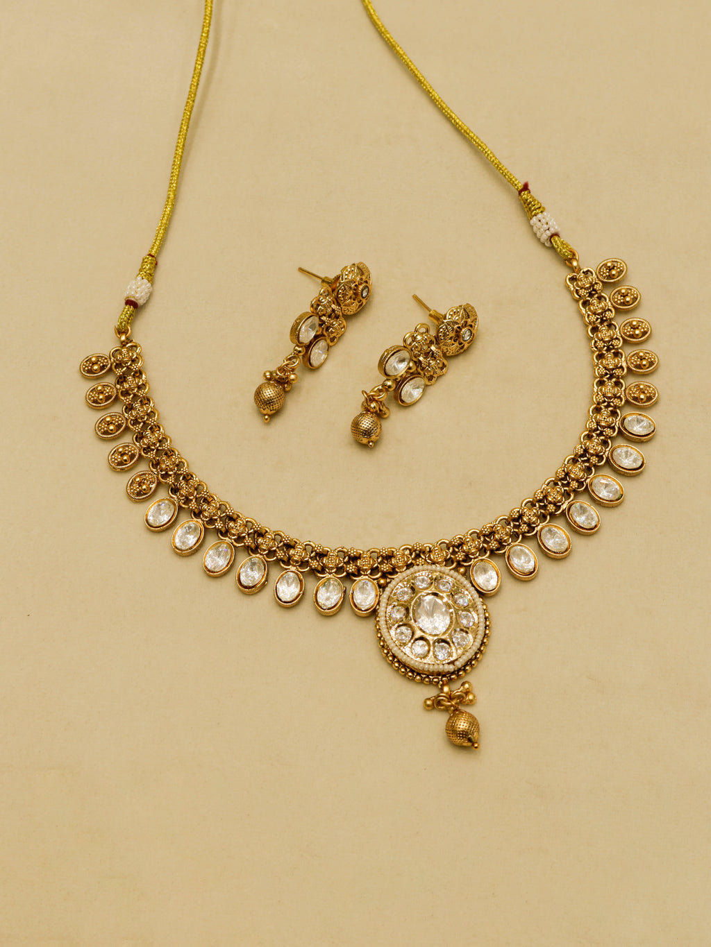 Aanura Ruby Beaded Kundan Necklace with Earrings