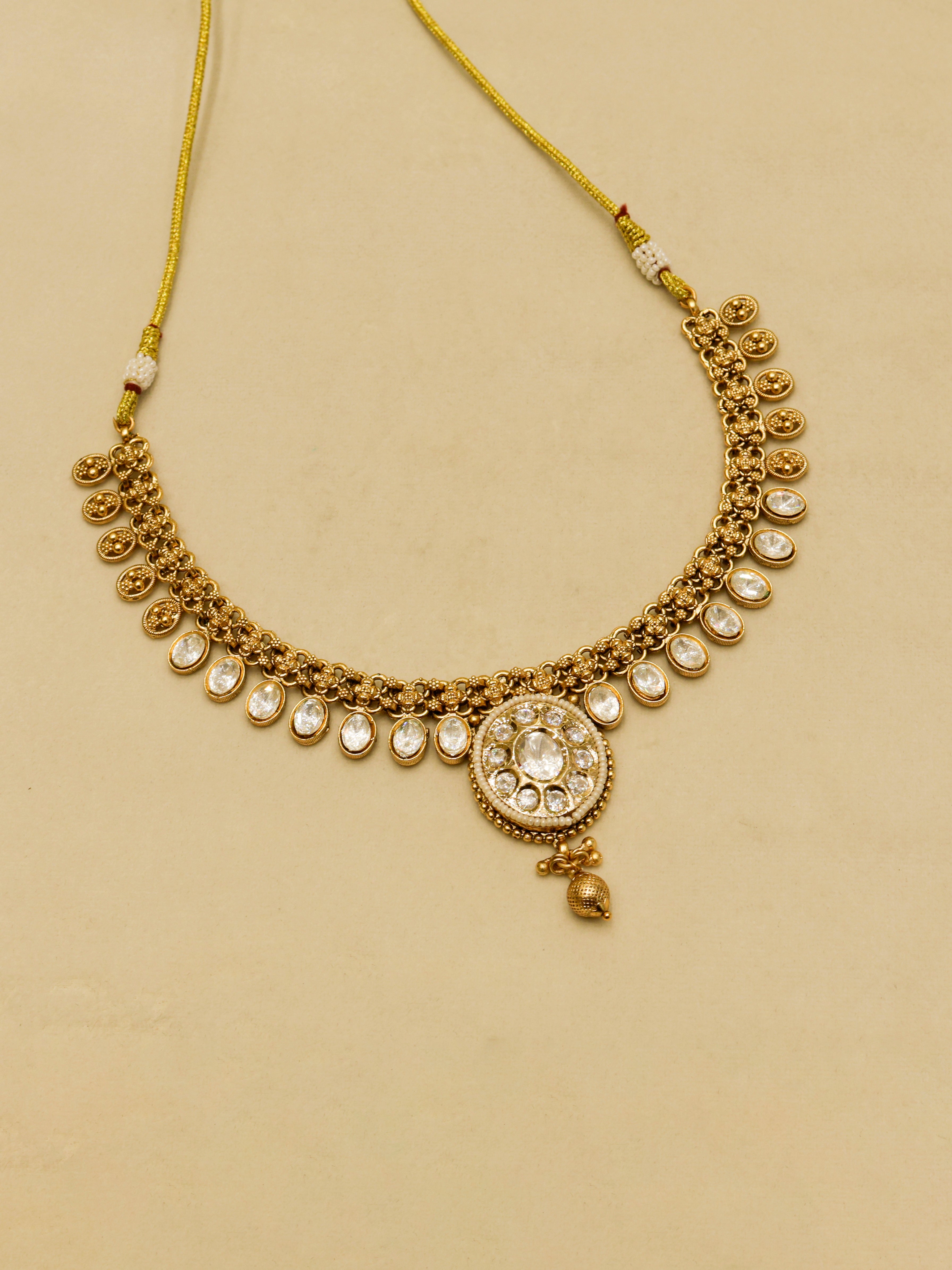 Aanura Ruby Beaded Kundan Necklace with Earrings