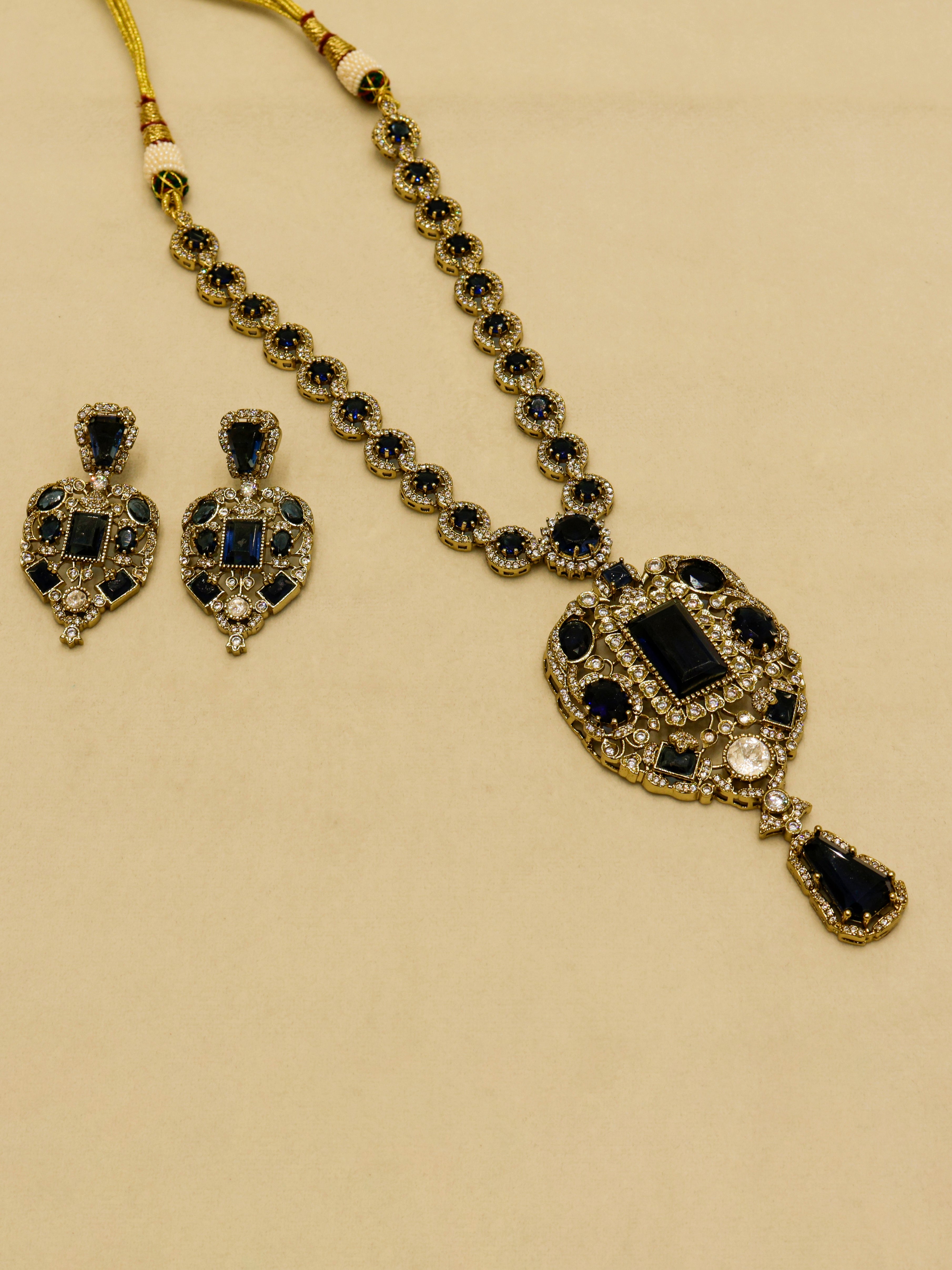 Aanura Red Stone Antique Kundan Necklace & Earrings