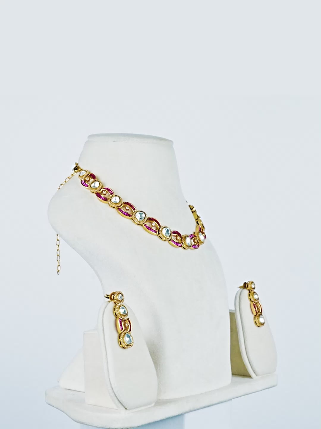 Aanura Oval Kundan Linked Necklace & Earrings