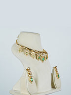 Aanura Peacock Green Kundan Necklace & Earrings Set